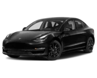 Front-side view of a 2023 Tesla Model 3 electric sedan in black, featuring a minimalist design with sleek LED headlights, aerodynamic curves, and black alloy wheels.