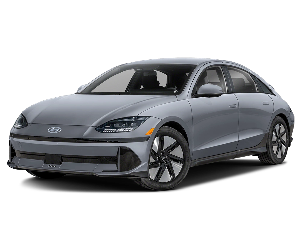 Front-side view of a 2025 Hyundai IONIQ 6 electric sedan in grey, showcasing its sleek, aerodynamic design with sharp LED headlights and modern styling.
