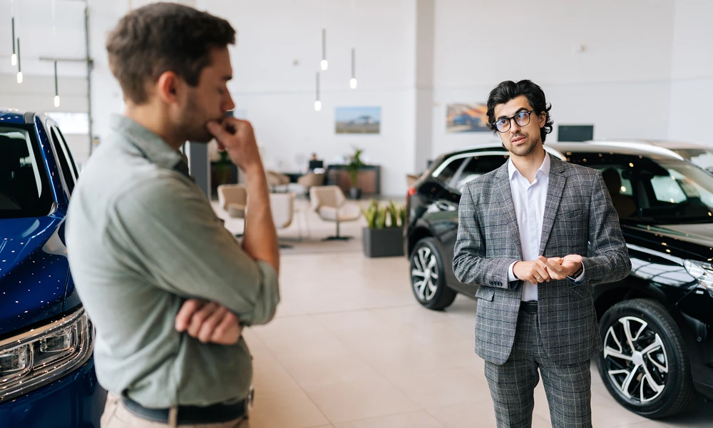 potential buyer with the dealer